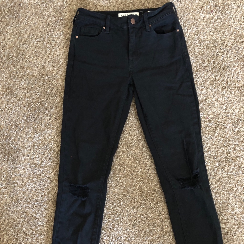 black ripped jeans